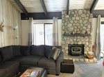Mammoth Lakes Condo Rental Sunshine Village 114: Modern Living Room with a Wood burning Stove
